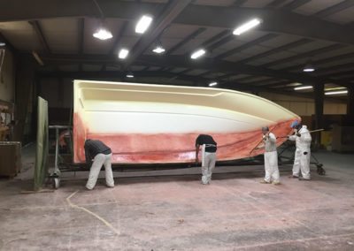 mean spray painting a boat