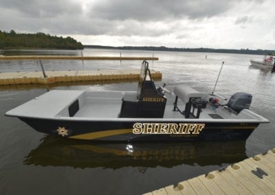 sheriff boat standing still side angle