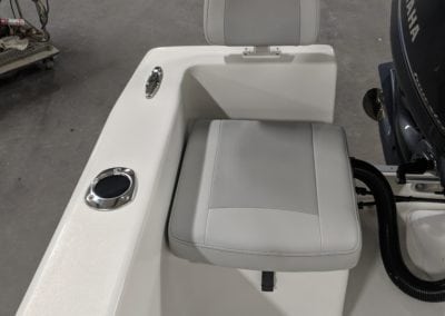 seat and cup holder on a boat